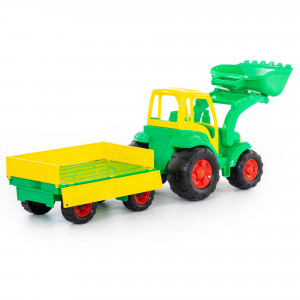 Velký Traktor s přívěsem a radlicí