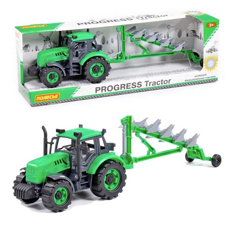 Traktor Progress s pluhy na setrvačník zeleny